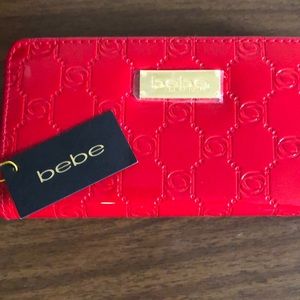 🆕 NWT Bebe red  clutch purse .